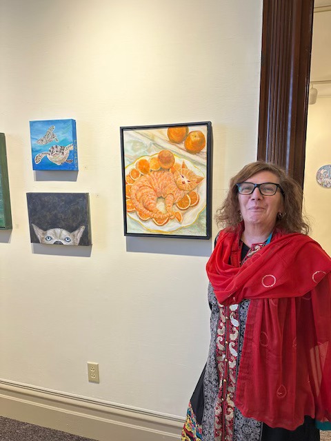 Carolyn working with artwork